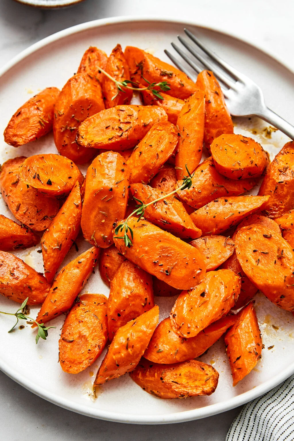 Air Fryer Roasted Carrots caramelized with herbs and parsley