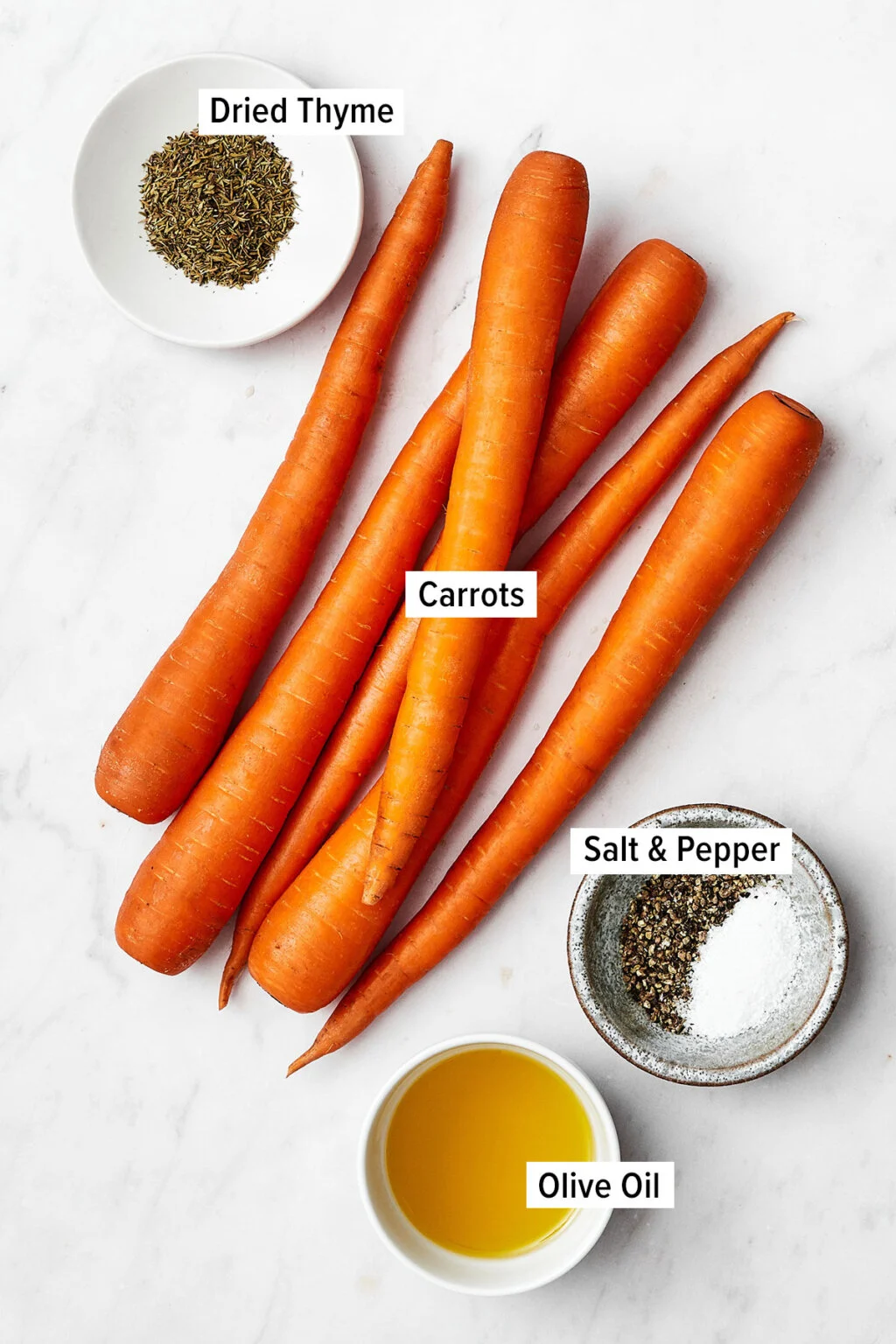 Preparing carrots for Air Fryer Roasted Carrots: peeled and cut