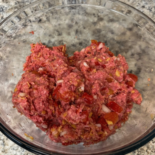 Mixing ground beef for Meatloaf Recipe