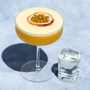 pornstar martini cocktail with passion fruit and prosecco shot